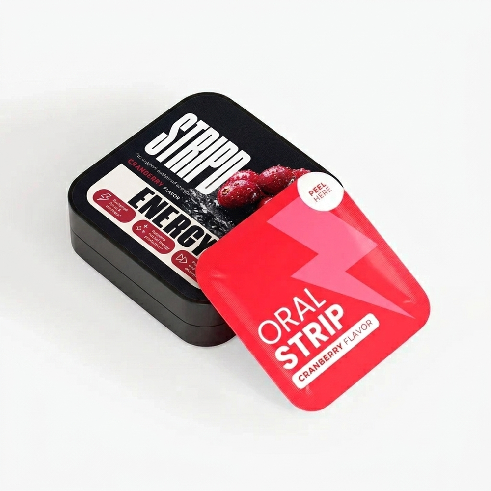 STRIPD Energy cranberry oral strips lifestyle shot with matte black pocket tin